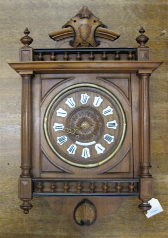 Appraisal: WALNUT CASE BALCONY WALL CLOCK French th century the carved