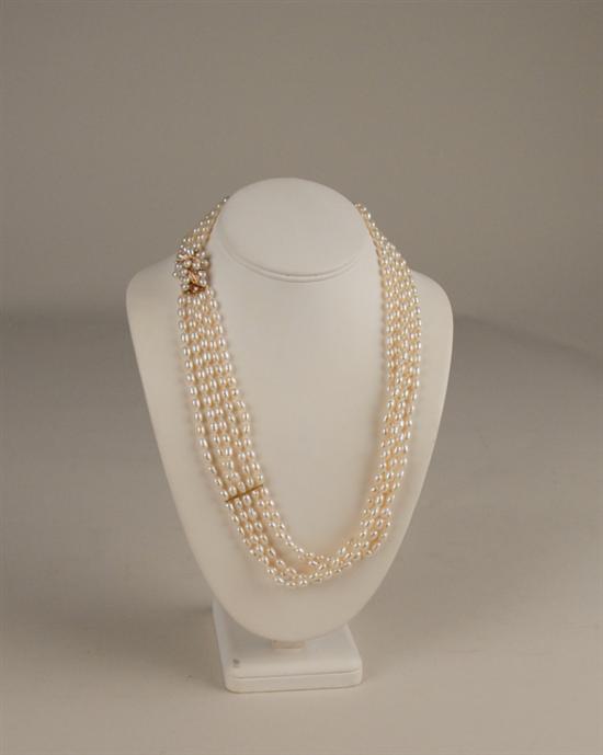 Appraisal: A Pearl Diamond and Gold Multi-strand Necklace having five graduated