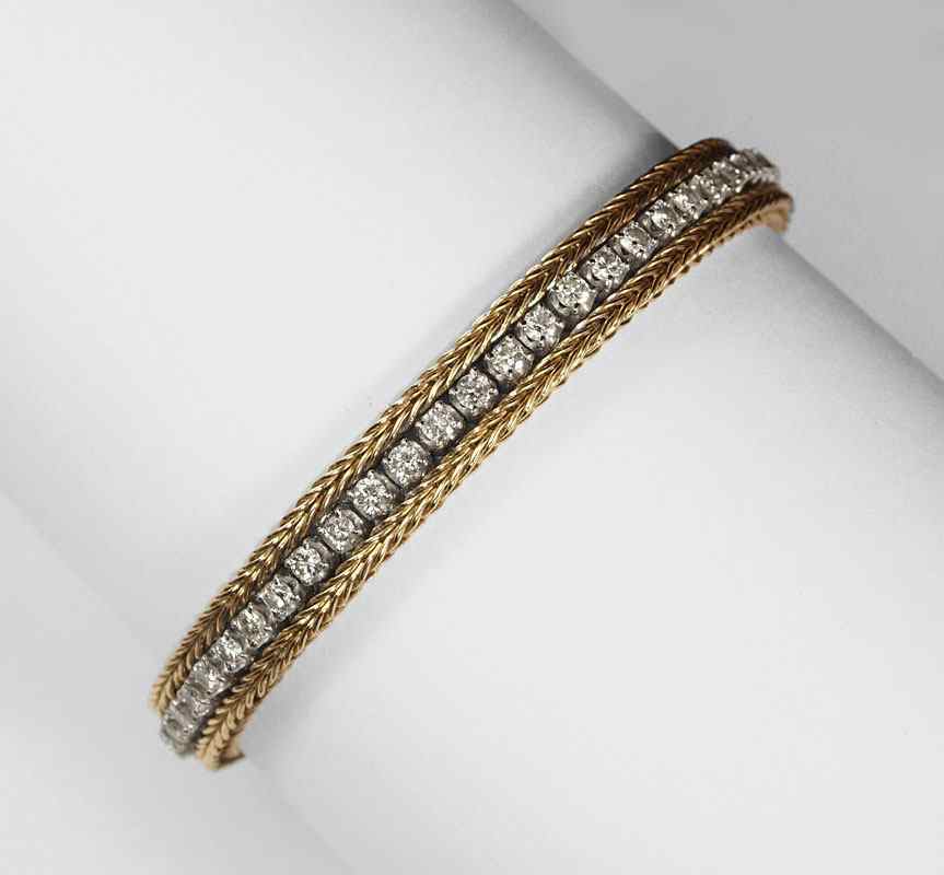 Appraisal: CTW DIAMOND LINE BRACELET K yellow and white gold bracelet