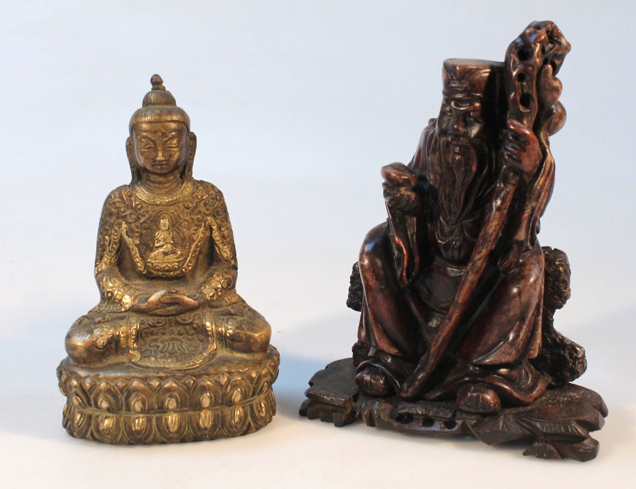 Appraisal: A Chinese soapstone style figure of a bearded sage in