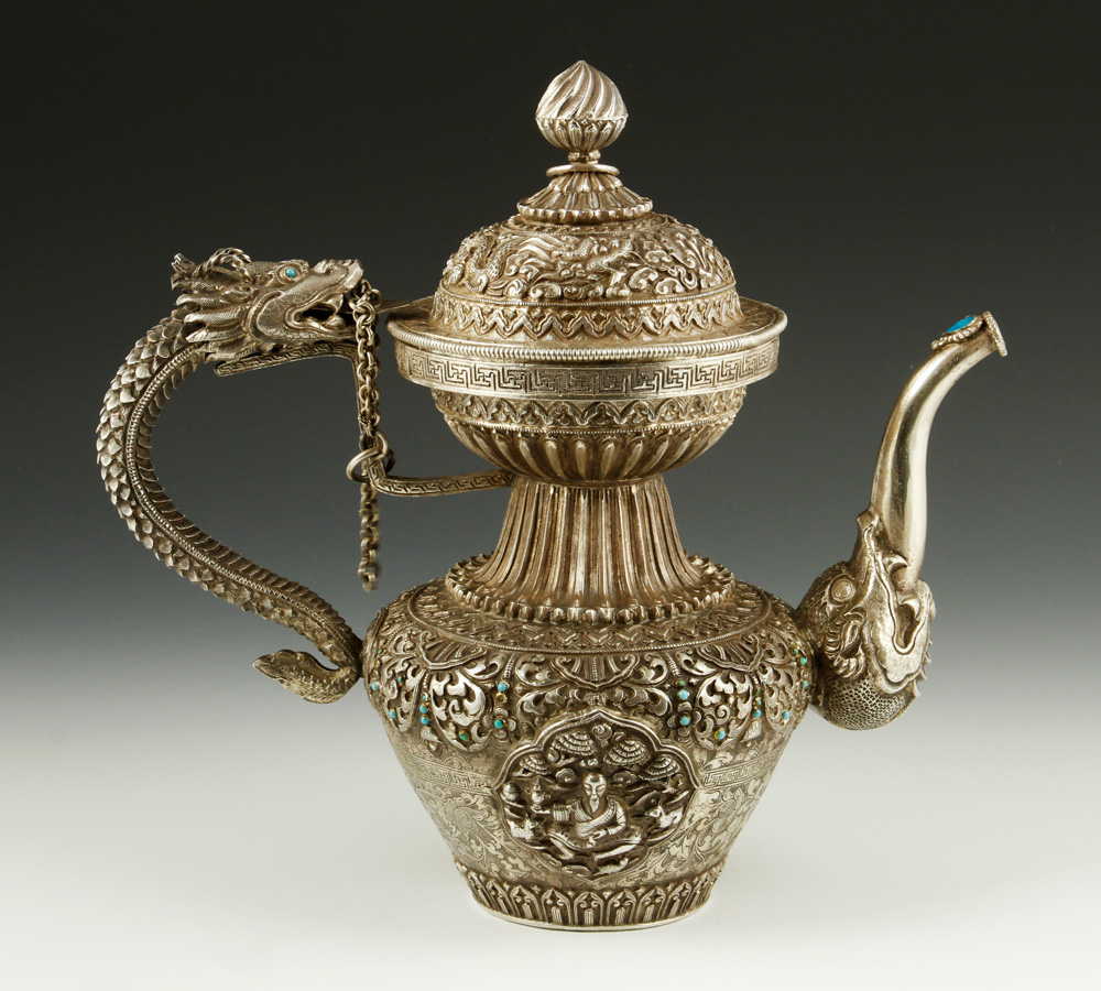 Appraisal: - Sino-Tibetan Silver Teapot Sino-Tibetan silver teapot intricately carved throughout