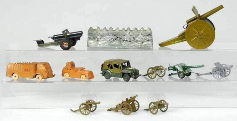 Appraisal: Lot of Britains Other Toy Cannons Vehicles Description pieces total