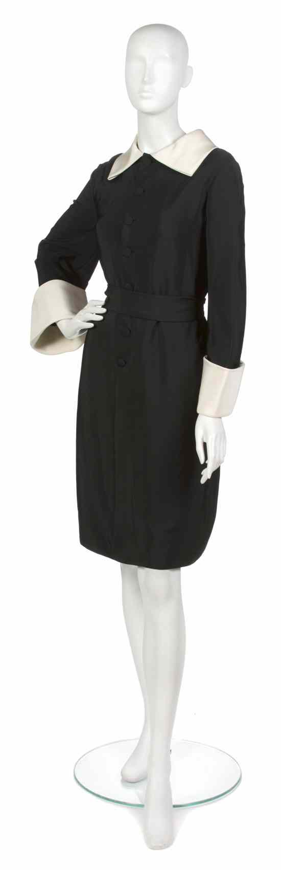 Appraisal: A Norman Norell Black Silk Shirt Dress wide cream collar