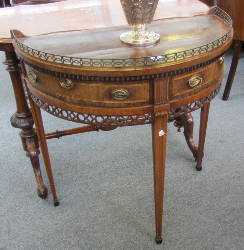 Appraisal: A late th century Dutch mahogany demi lune side table