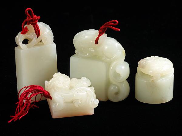 Appraisal: Four white jade seals th th Century The first with