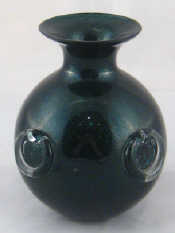 Appraisal: A dark green speckled Murano glass globe vase with prunts