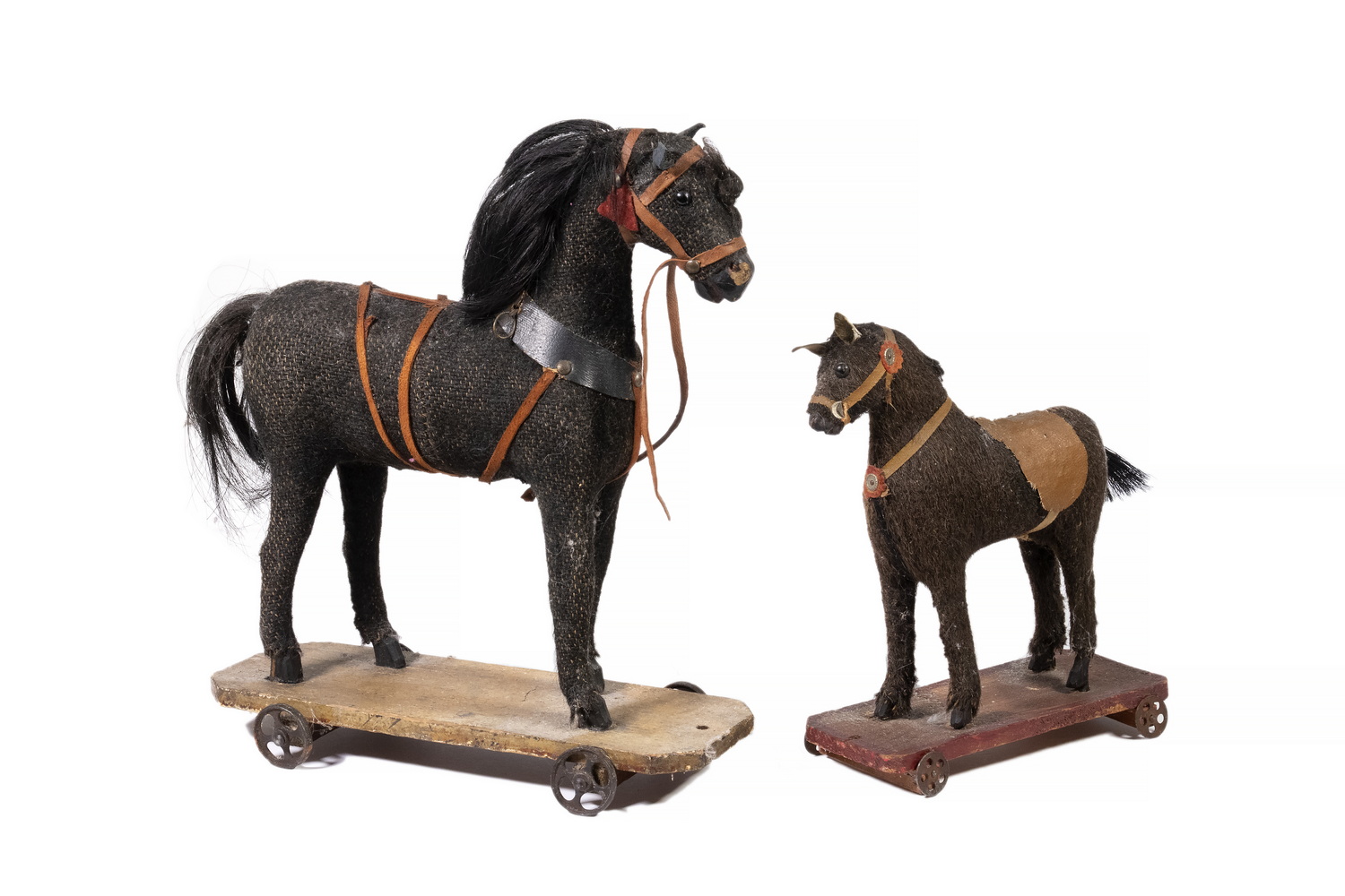 Appraisal: GERMAN HORSE PULL TOYS Lot of Early th c Figural