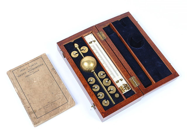 Appraisal: A SIKE'S HYDROMETER with pocket edition of spirit tables by