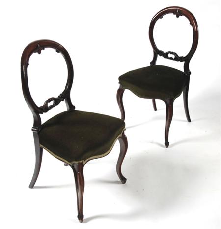 Appraisal: A set of five Victorian rosewood balloon back chairs each