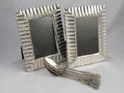 Appraisal: A pair of modern silver plated photo frames x cm