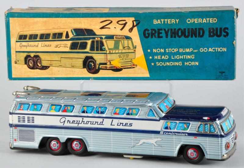 Appraisal: Lot of Tin Greyhound Bus Battery-Operated Toys Description Japanese Made