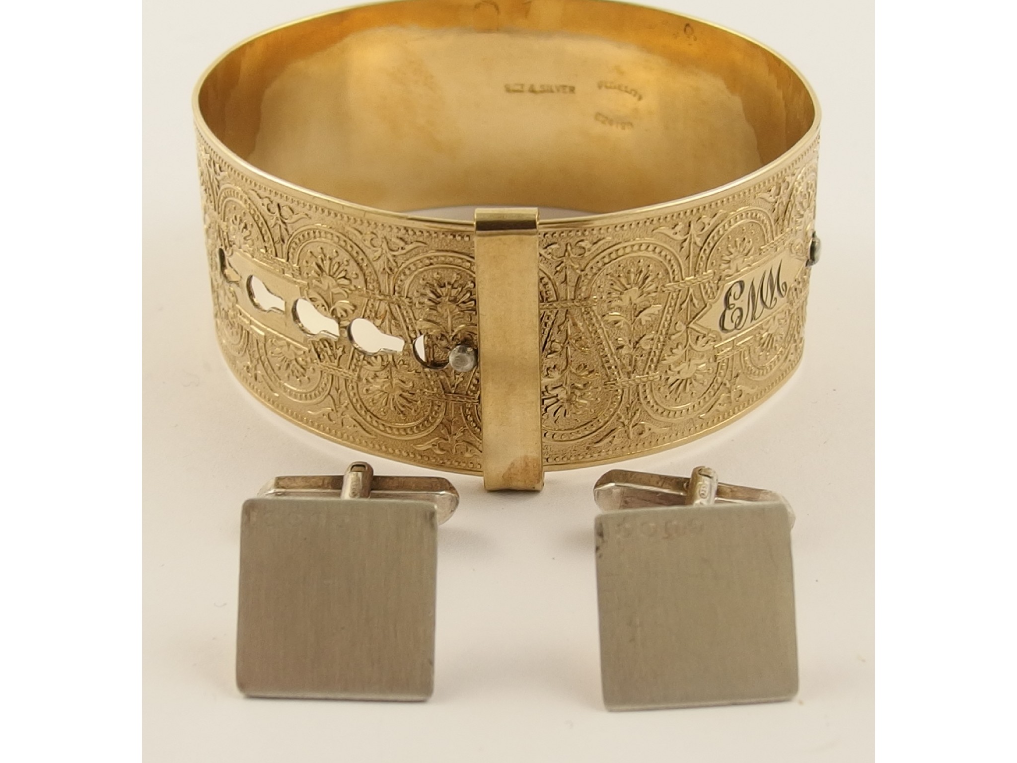 Appraisal: A wide silver gold plated bangle and a pair of