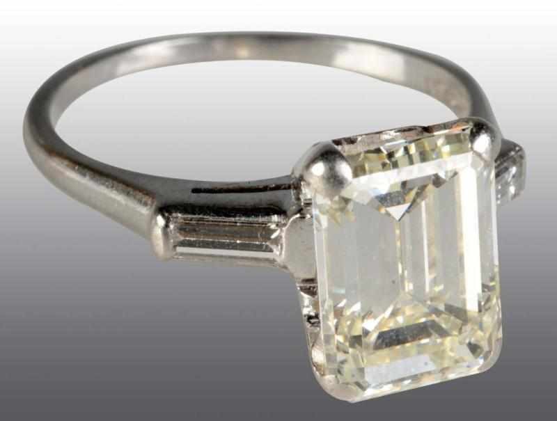 Appraisal: Platinum Engagement Ring with Diamonds Description One emerald-cut diamond ct