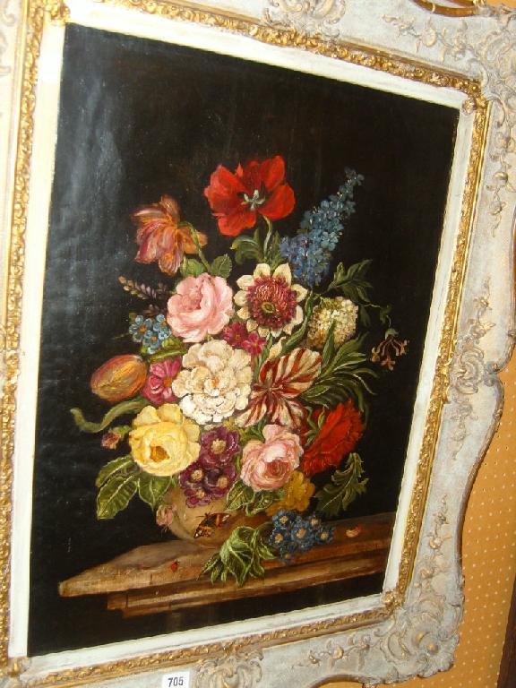 Appraisal: An oil painting in canvas of a floral still life