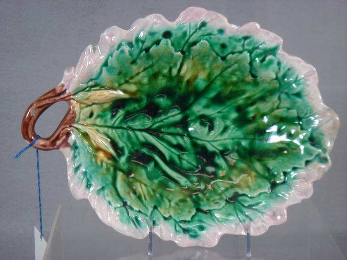 Appraisal: Etruscan majolica leaf dish glaze chip on handle l Griffen