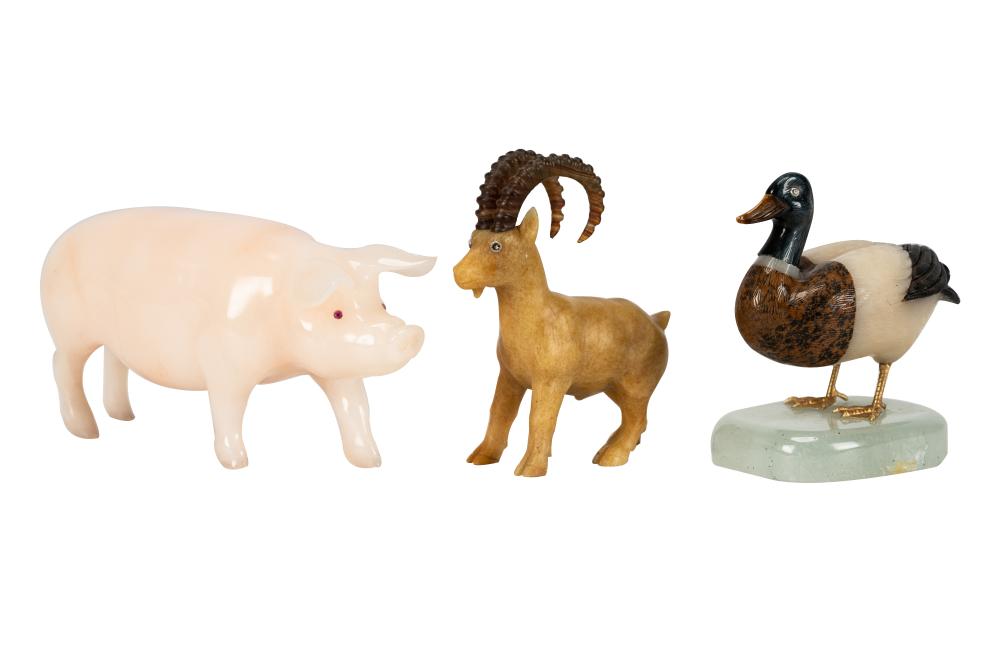 Appraisal: THREE CARVED STONE ANIMALScomprising a multi-stone ram and duck and