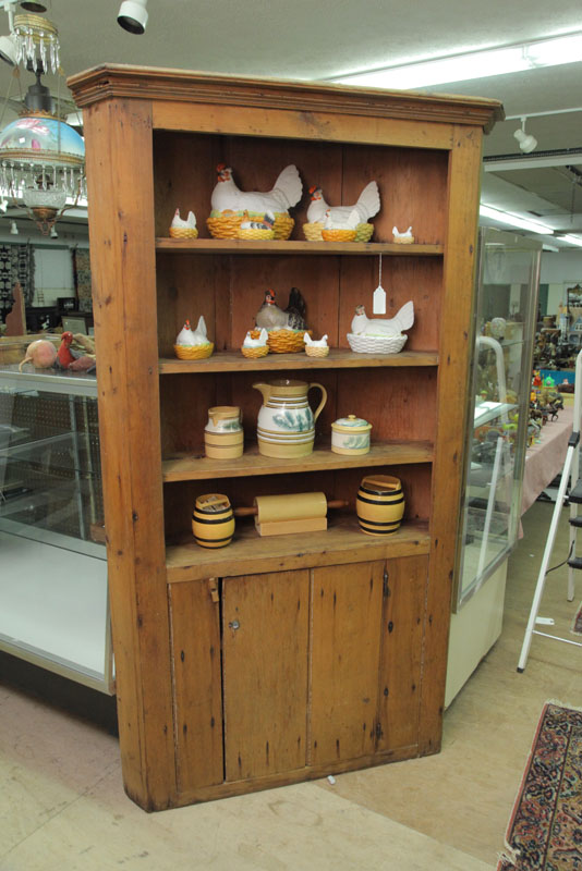 Appraisal: CORNER CUPBOARD Pine having square nail construction a step molded