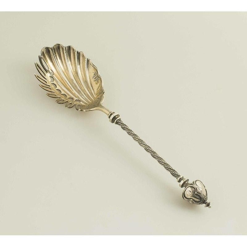 Appraisal: American Silver Macaroni Serving Spoon American silver and silver gilt