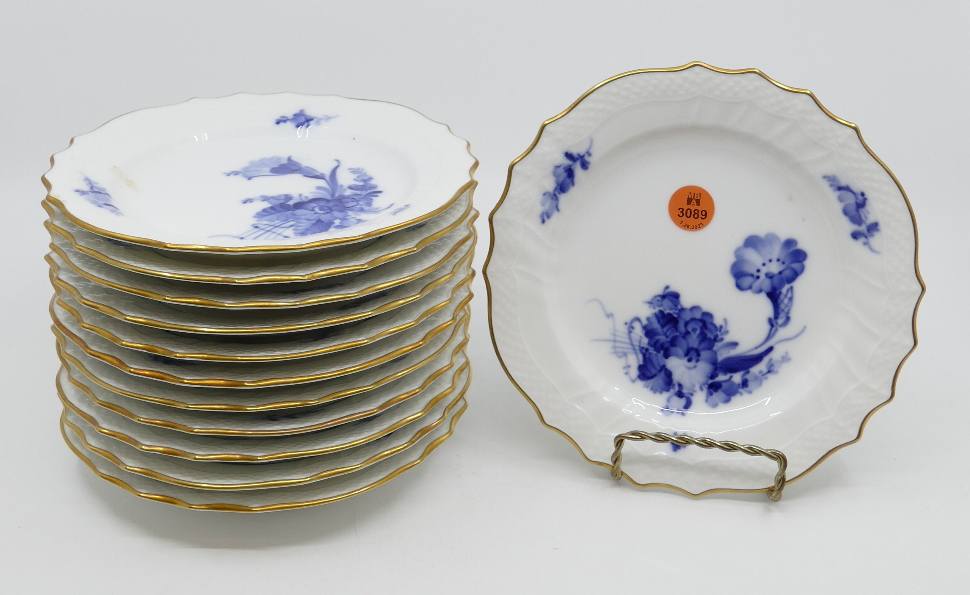 Appraisal: pc Royal Copenhagen Blue Flowers Curved Dessert Plate Gilt edges