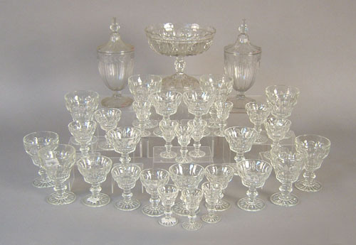 Appraisal: Large group pressed glass stemware th c together with compote