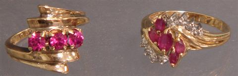 Appraisal: K YG rings with red stones one with small diamonds