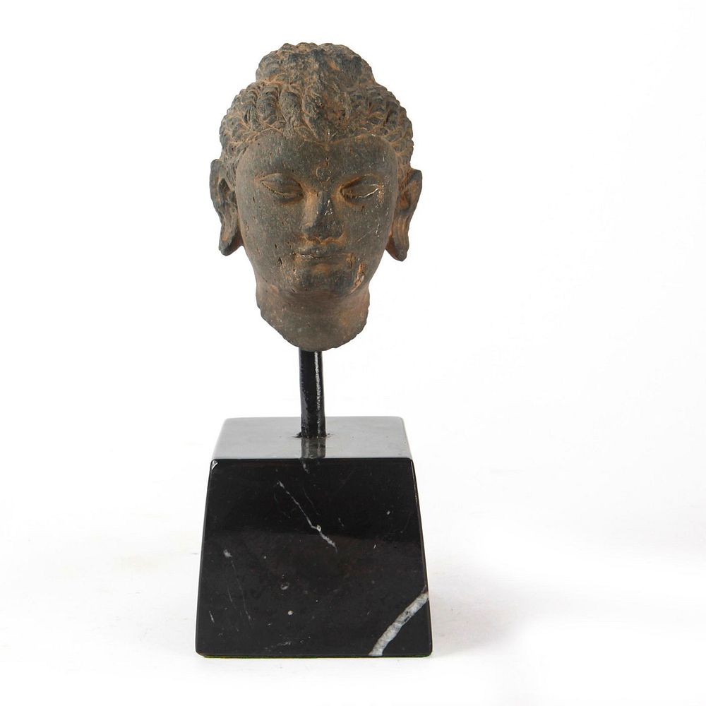 Appraisal: ANCIENT GANDHARAN SCHIST STONE HEAD OF BUDDHA Graeco-Indian style finely