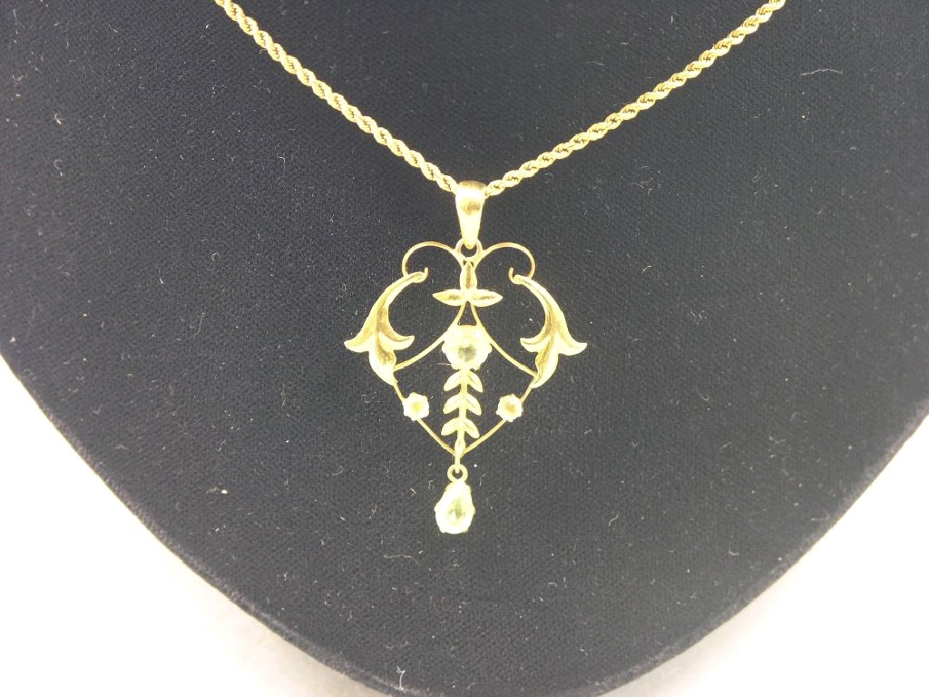 Appraisal: An Art Nouveau ct gold pendant set with peridot on