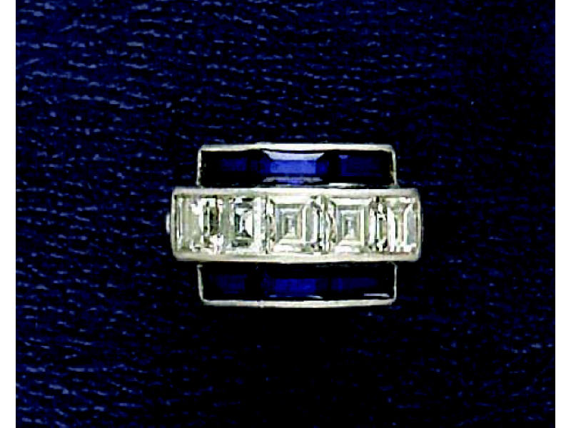 Appraisal: DIAMOND AND SAPPHIRE RING Platinum lady's ring set with five