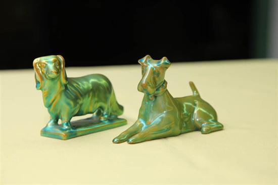 Appraisal: TWO ZSOLNAY DOG FIGURES A terrier h And a datsun