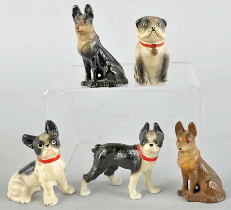 Appraisal: Lot of Cast Iron Dog Paperweights Description Made by Hubley