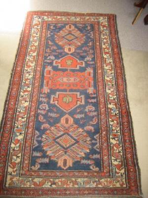 Appraisal: A NORTH WEST PERSIAN RUG early th century the blue