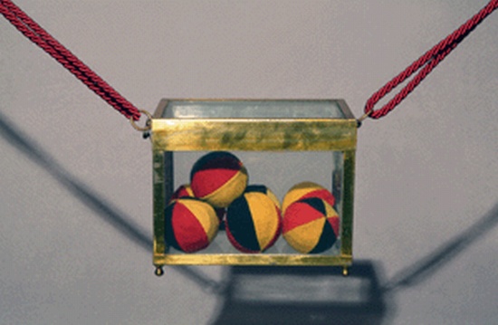 Appraisal: GLASS BALL CASKET The casket is suspended by cords from