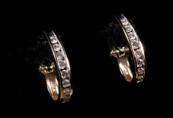 Appraisal: PAIR K YELLOW GOLD AND DIAMOND OVAL LOOP EARRINGS Each