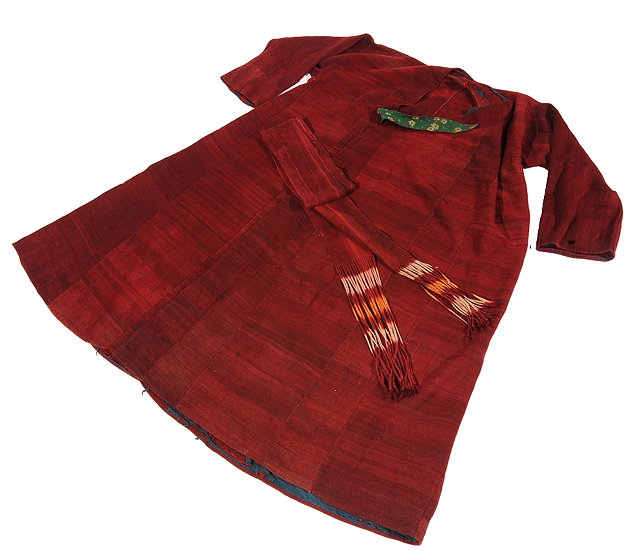 Appraisal: A TIBETAN MONK'S COAT madder red with belt