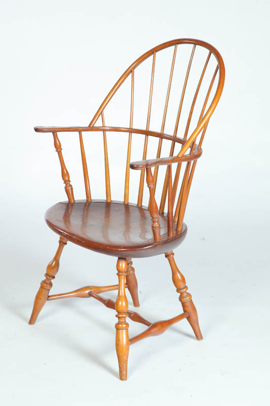 Appraisal: WINDSOR ARMCHAIR Sackback with turned arm posts and legs and