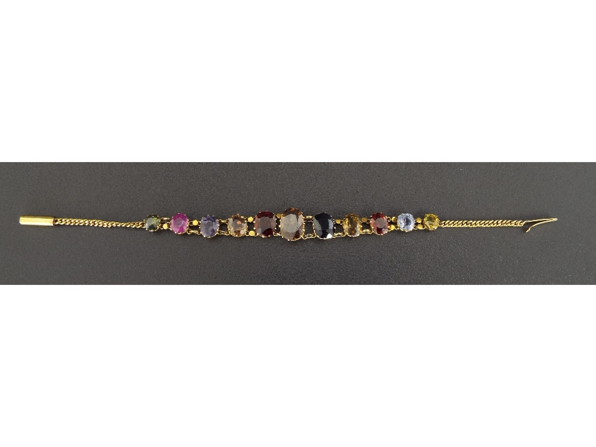 Appraisal: Attractive gem set yellow metal bracelet set with coloured gem