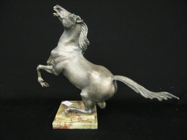 Appraisal: Silvered Bronze Sculpture of a Rearing Horse onyx base signed