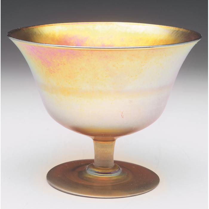 Appraisal: L C Tiffany vase footed shape in gold favrile glass