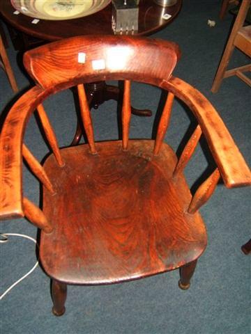 Appraisal: An ash and elm Captain's chair