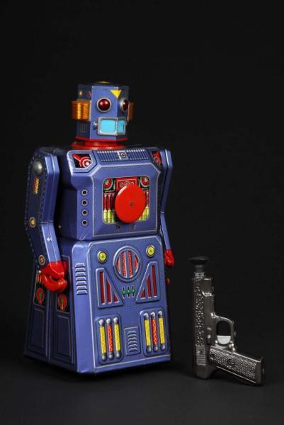 Appraisal: Tin Target Robot with Original Gun Description Japanese Made by