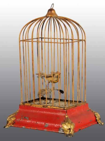 Appraisal: Tin Hand-Painted Birdcage Wind-Up Toy Description German Working When wound