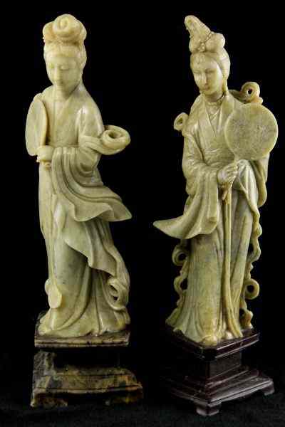 Appraisal: Two Asian Hardstone Guanyinseach carved with round fan and ornate