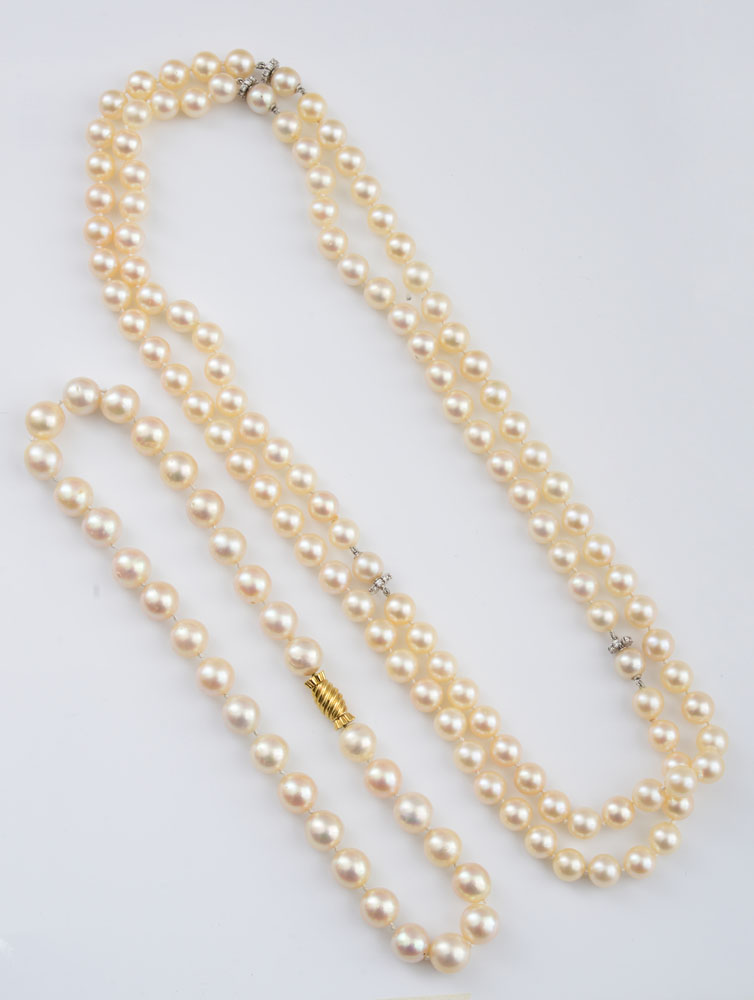 Appraisal: TWO CULTURED PEARL NECKLACES Four single strand segments of to