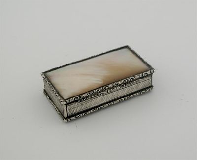 Appraisal: A Victorian mounted mother of pearl snuff box with engine