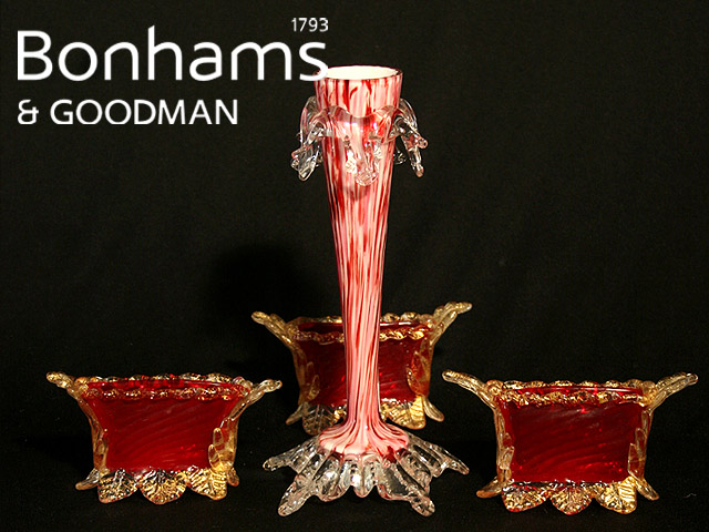 Appraisal: A set of three twin handled footed posy vases in