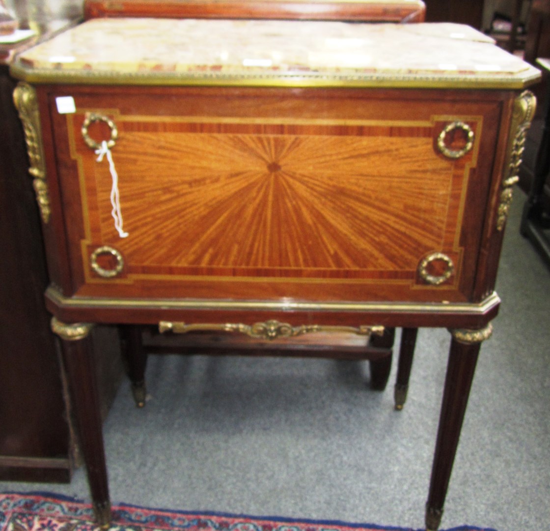 Appraisal: A Louis XV style gilt metal mounted satinwood side cabinet