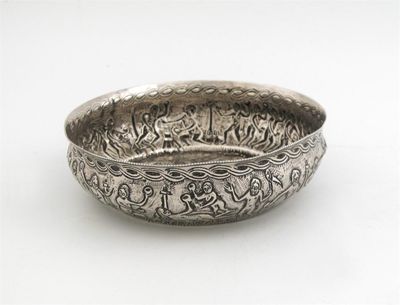 Appraisal: A late th century embossed shallow bowl decorated with a