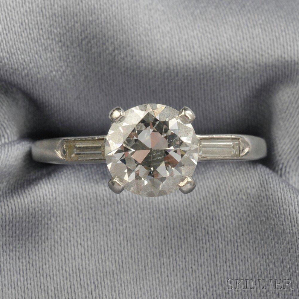 Appraisal: Platinum and Diamond Solitaire prong-set with a transitional-cut diamond weighing