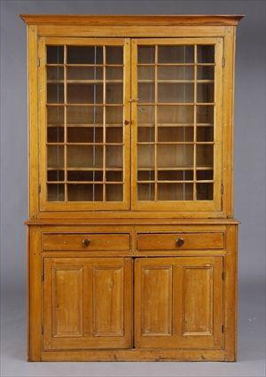 Appraisal: AMERICAN PINE STEP-BACK CUPBOARD The upper part with molded cornice