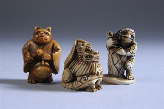 Appraisal: THREE JAPANESE IVORY NETSUKE th century Carved to depict phoenix